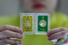 Vàng 'thắng đậm' trước chứng khoán